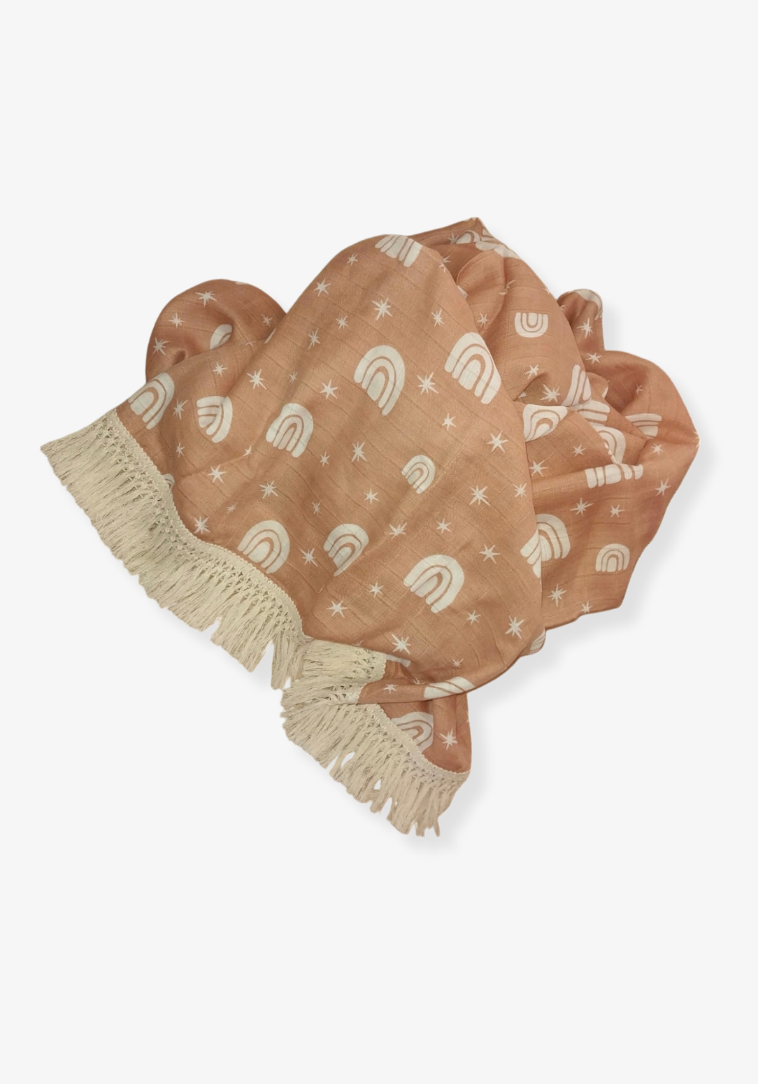 Peach baby blanket with white rainbow and star patterns, edged with cream fringe. Perfect for cozy snuggles.