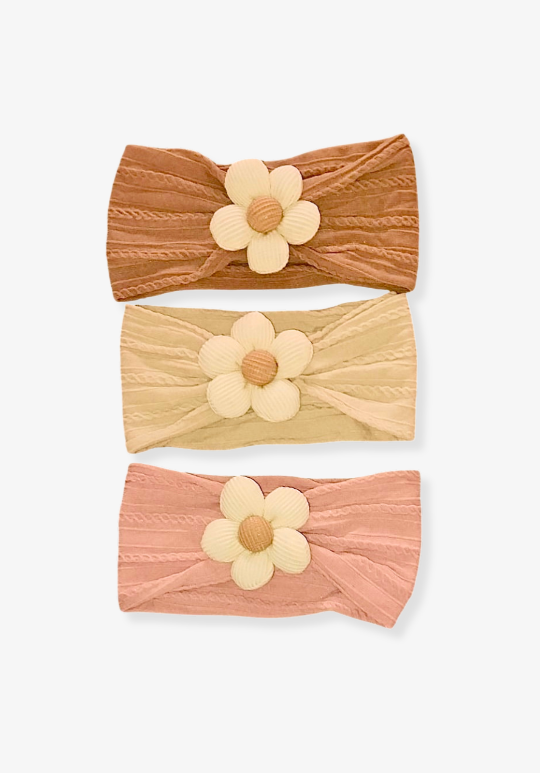 Oat-colored toddler head band with a cream daisy flower sewn at the center.