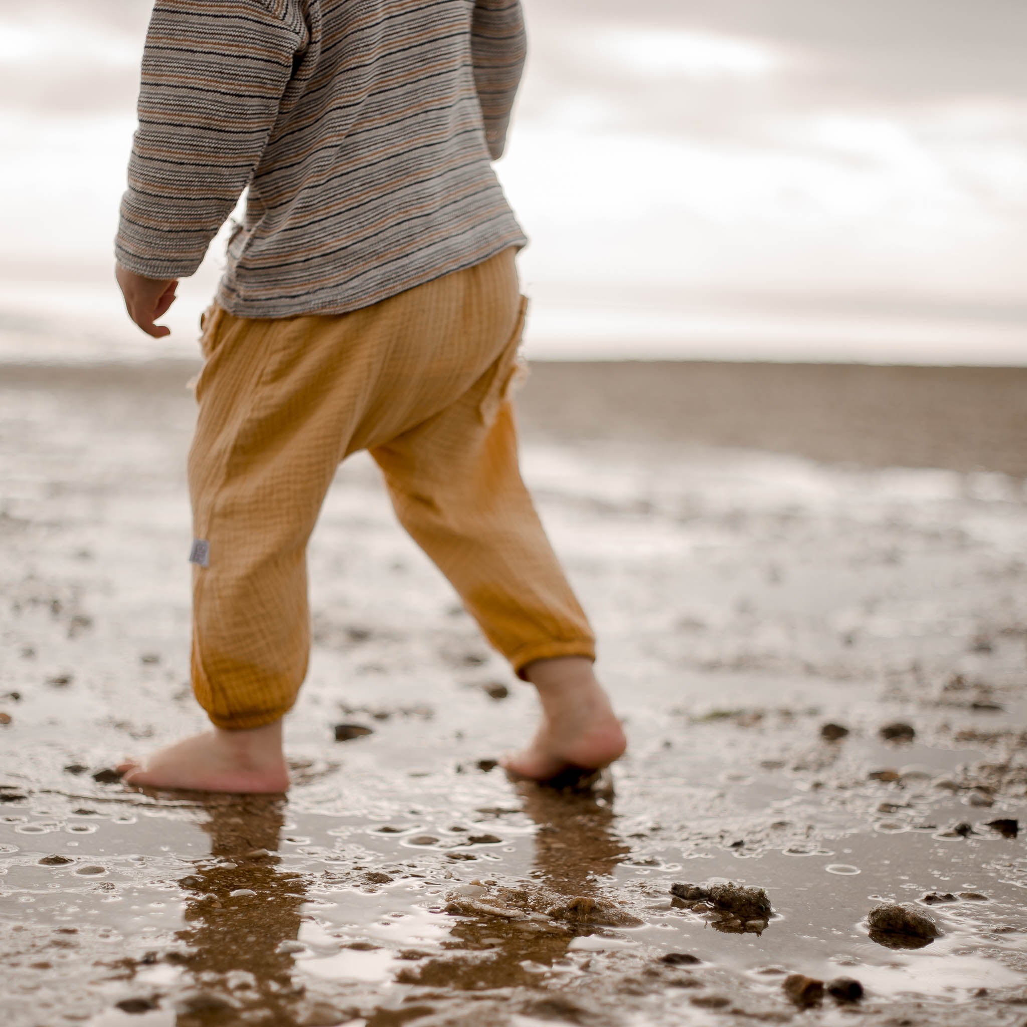 soft organic cotton neutral baby and toddler harem pants mustard