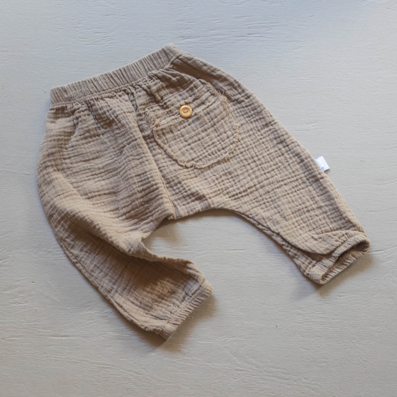 soft organic cotton neutral baby and toddler harem pants brown