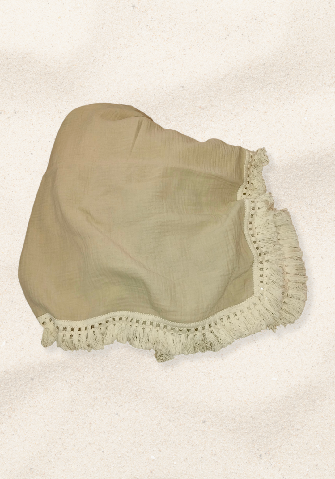 Neutral beige baby blanket with delicate fringe, crafted from cotton and bamboo for softness and breathability.