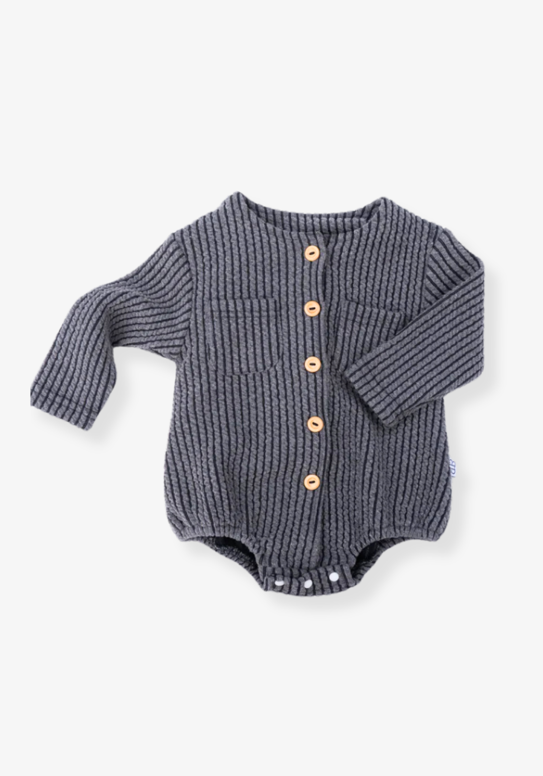 Charcoal cotton baby bubble romper with long sleeve design and gathered leg openings with three snap buttons at the bottom